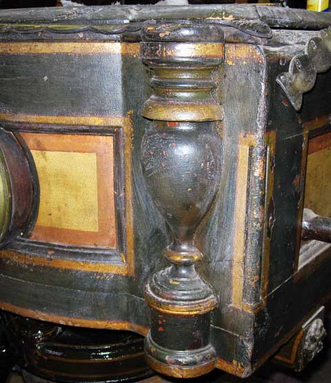 Roman Urn on front corner of hand engine.